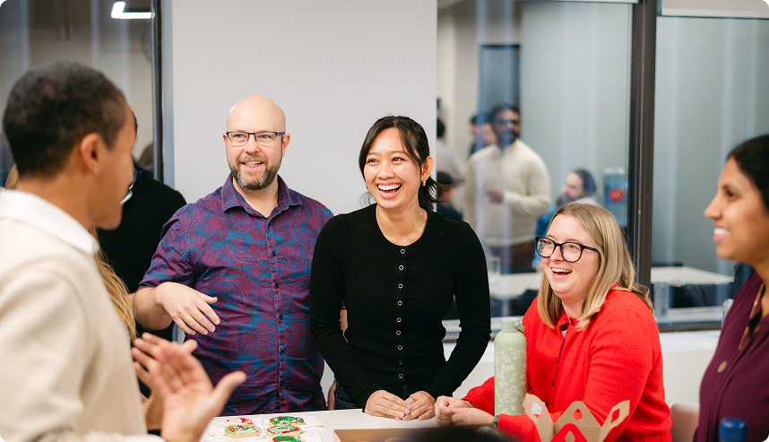 OneVest team collaborating in the office